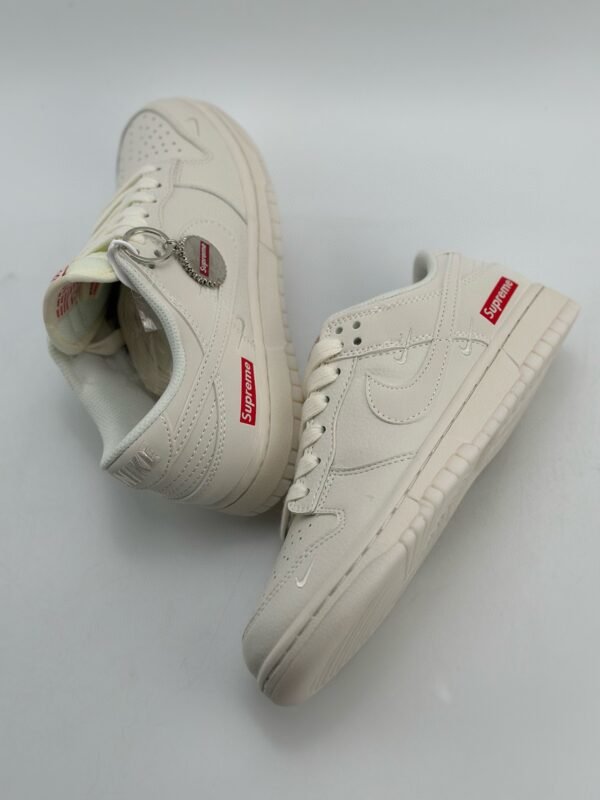NIKE SB Dunk Low x Supreme Milk White - Image 4