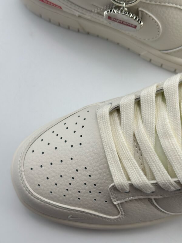 NIKE SB Dunk Low x Supreme Milk White - Image 9